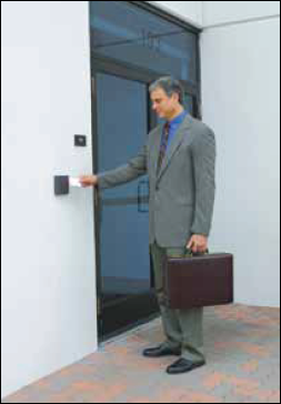 Fig.1: A user is trying to open the door by placing an RFID tag near the RFID reader