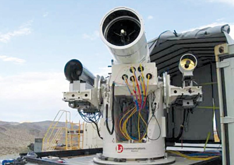 A laser with US Naval Sea Systems Command (NSSC), which is an electromagnetic gun prototype (Image courtesy: www.occupycorporatism.com)