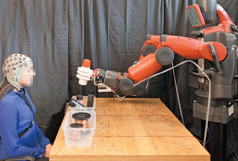 Using MIT’s new system, supervisors can correct a robot’s mistakes by simply thinking about it (Image courtesy: MIT)