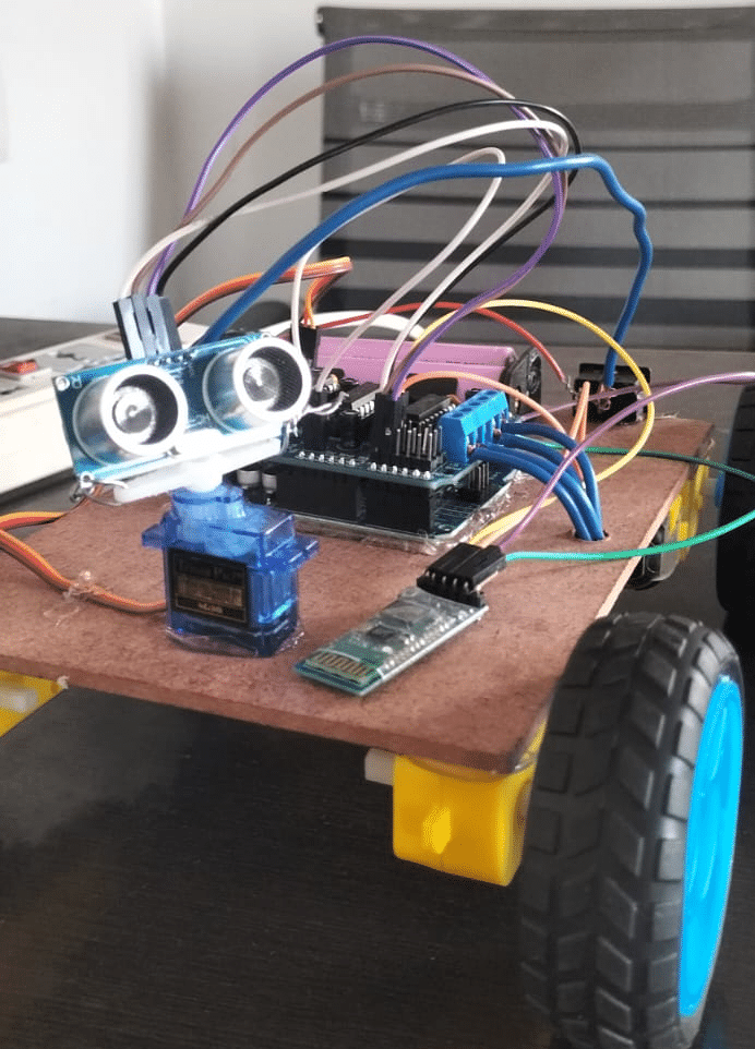Arduino based Voice-Controlled Obstacle-Avoiding Robot