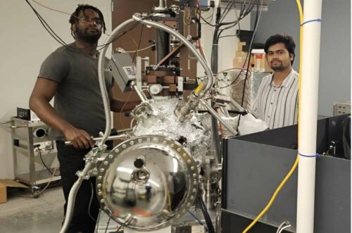 Kushal Rijal (right) and Neno Fuller (left) performed the TR-TPPE measurement using the ultra-high vacuum photoemission spectroscopy system shown in the picture.